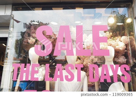 Dont miss the Last Days of Sale at the Fashion Store Window Display featuring amazing deals Dont miss the Last Days of Sale at the Fashion Store Window Display featuring amazing deals 119009365