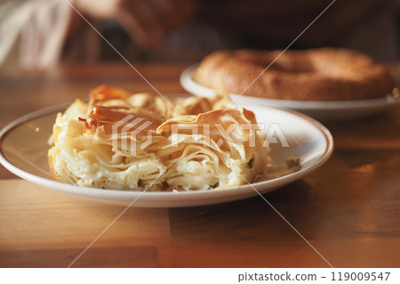 Traditional Turkish Cuisine Pastries borek on a plate Traditional Turkish Cuisine Pastries borek on a plate 119009547