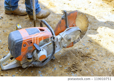 Gasoline fuel powered saw with a diamond blade for cutting concrete in ready to use condition Gasoline fuel powered saw with a diamond blade for cutting concrete in ready to use condition 119010751