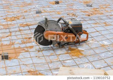 Gasoline petrol saw with a diamond blade for cutting concrete ready for use Gasoline petrol saw with a diamond blade for cutting concrete ready for use 119010752