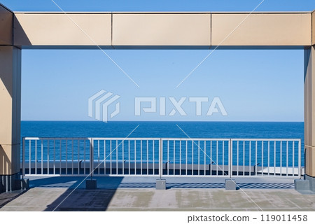 A terrace overlooking the deep blue sea A terrace overlooking the deep blue sea 119011458