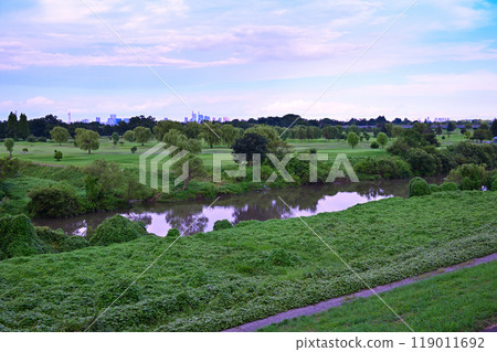 Irumagawa River at dusk, Saitama New City in the distance, view from Kamie Bridge 119011692