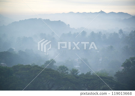 Early morning on the mountain top beautiful sunrise and gentle light In the valley there is fog that stretches like a wet sea. Fog - to good weather at Mrauk-U , Rakhine State, Myanmar. 119013668