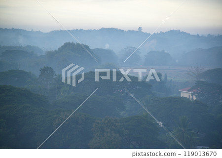 Early morning on the mountain top beautiful sunrise and gentle light In the valley there is fog that stretches like a wet sea. Fog - to good weather at Mrauk-U , Rakhine State, Myanmar. 119013670