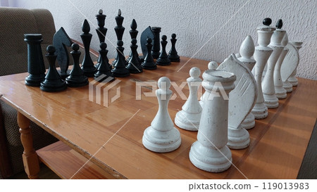 Old chess on an old chessboard Old chess on an old chessboard 119013983