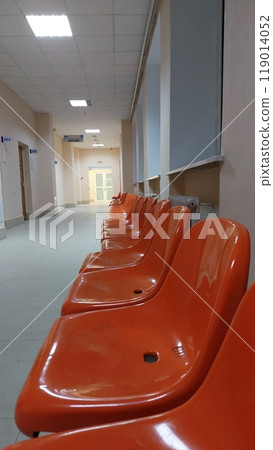 Red Plastic Seats in Hospital Lobby Red Plastic Seats in Hospital Lobby 119014052