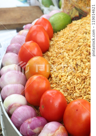 fried flattened rice and chanachur stock with onion, tomato, lemon 119014621