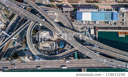 Aerial view highway and overpass Osaka City, Junctions of city highway vehicles drive on roads Osaka City, Japan, Highway interchange, Expressway important infrastructure, Osaka City, Japan. Aerial view highway and overpass Osaka City, Junctions of city highway vehicles drive on roads Osaka City, Japan, Highway interchange, Expressway important infrastructure, Osaka City, Japan. 119015299