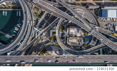 Aerial view highway and overpass Osaka City, Junctions of city highway vehicles drive on roads Osaka City, Japan, Highway interchange, Expressway important infrastructure, Osaka City, Japan. 119015300