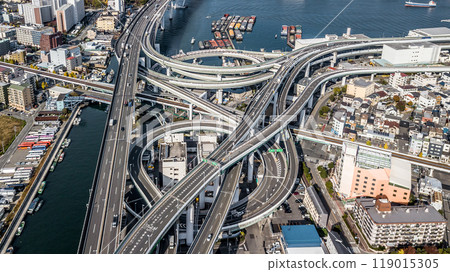 Aerial view highway and overpass Osaka City, Junctions of city highway vehicles drive on roads Osaka City, Japan, Highway interchange, Expressway important infrastructure, Osaka City, Japan. 119015305