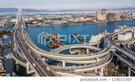 Aerial view highway and overpass Osaka City, Junctions of city highway vehicles drive on roads Osaka City, Japan, Highway interchange, Expressway important infrastructure, Osaka City, Japan. 119015307