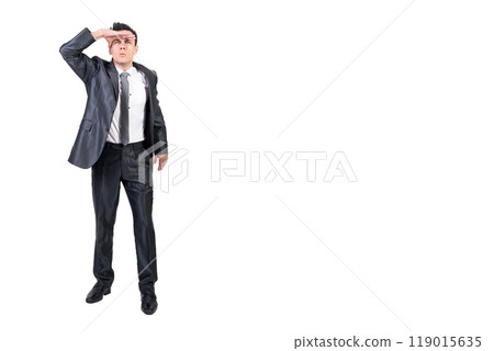 Focused man looking away in studio. White background. 119015635