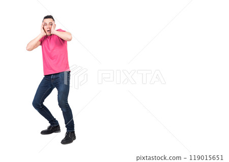 Scared man touching head and looking at camera 119015651