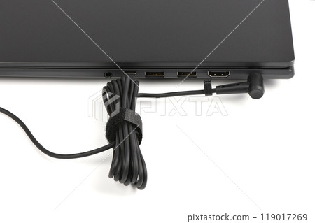 Close-up laptop power connector. Close-up laptop power connector. 119017269