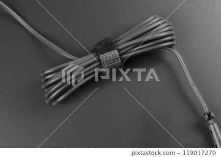 Close-up of black power cable. Close-up of black power cable. 119017270
