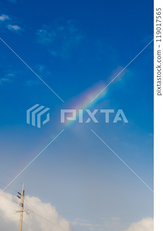 Rainbow in the blue sky 119017565