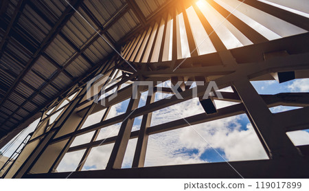 A structure featuring wooden slats on construction site contributing to its architectural style 119017899