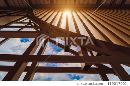 A structure featuring wooden slats on construction site contributing to its architectural style 119017901