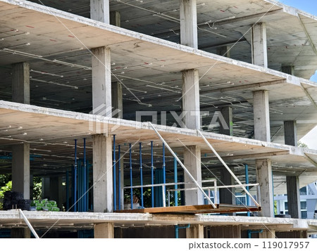 A new modern multi-storey residential building under construction 119017957