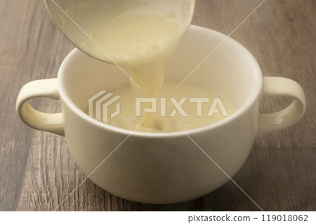 Sweet potato potage served in a soup cup Sweet potato potage served in a soup cup 119018062