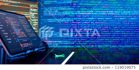 Technology background. Development, programming and coding technology concept. A programmer manually works with program code 119019075