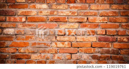 Old weathered red brick wall as creative background. 119019761