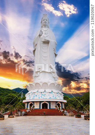 Big white statue of Lady Buddha in Da Nang in the Linh Nga Pagoda in Vietnam in Asia in summer at sunset Big white statue of Lady Buddha in Da Nang in the Linh Nga Pagoda in Vietnam in Asia in summer at sunset 119020067