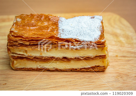 Mille feuille cake layers cream napoleon dessert sweet piece. 119020309
