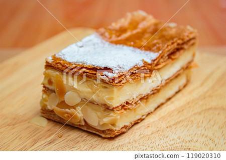 Mille feuille cake layers cream napoleon dessert sweet piece. Mille feuille cake layers cream napoleon dessert sweet piece. 119020310
