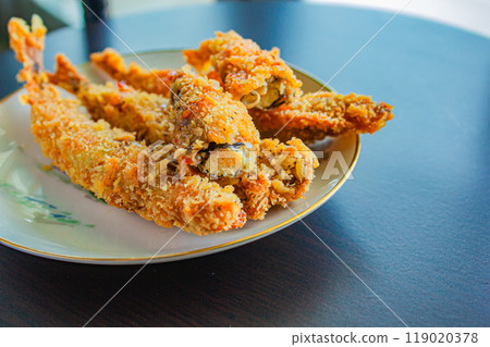 Deep fried Capelin Fish (Shishamo), Thai fried battered egg fish. 119020378
