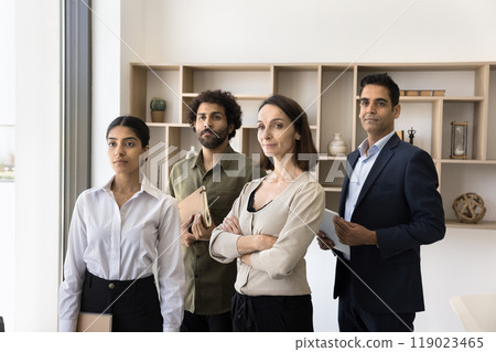 Motivated diverse businesspeople team stand together united by common goal 119023465