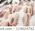 Fresh fish placed on the ice in the supermarket for sale. 119024782