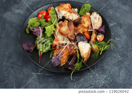 Mix of baked chicken pieces. Mix of baked chicken pieces. 119026042