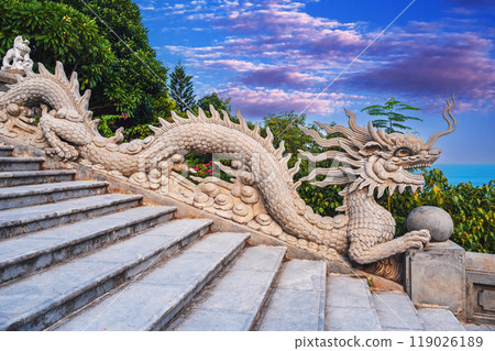 dragon statue decorates the staircase at Linh Ung Pagoda leading to Lady Buddha in Da Nang in Vietnam in Asia dragon statue decorates the staircase at Linh Ung Pagoda leading to Lady Buddha in Da Nang in Vietnam in Asia 119026189
