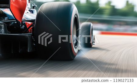 Fast moving race car tires on racetrack, showcasing speed and precision. blurred background emphasizes dynamic motion and excitement of motorsport 119027133