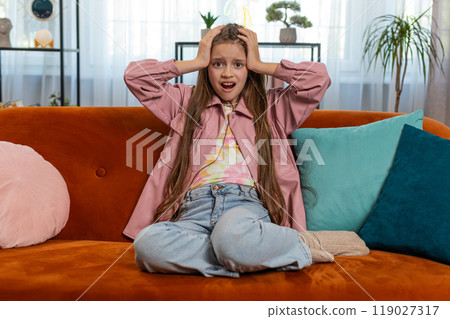 Young sad girl child feeling hopelessness and loneliness nervous breakdown loss unlucky bad news Young sad girl child feeling hopelessness and loneliness nervous breakdown loss unlucky bad news 119027317