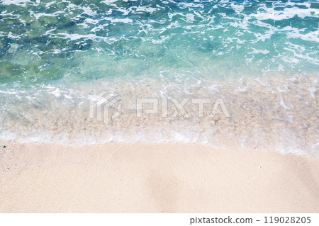 Emerald green sea and beautiful sandy beach 119028205