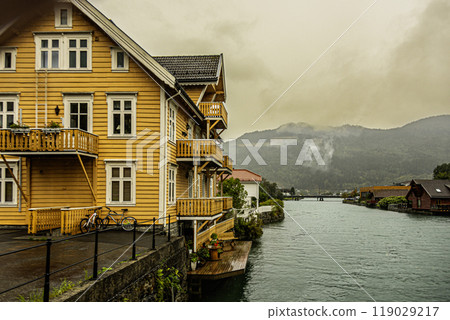 Bank of the Stryneelva River as it passes through the city of Stryn. Norway. 119029217
