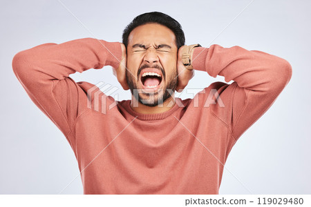 Shouting, anxiety and hands on ears of asian man in studio with headache, brain fog or frustrated on grey background. Noise, stress and angry guy person scream for tinnitus, depression or vertigo 119029480