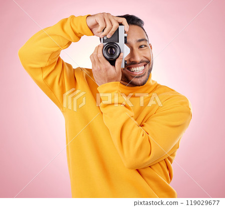 Portrait, man with a camera and smile for photography, taking a picture for art, travel or record of a happy memory. Creative photographer, happiness and shooting on retro or vintage film technology Portrait, man with a camera and smile for photography, taking a picture for art, travel or record of a happy memory. Creative photographer, happiness and shooting on retro or vintage film technology 119029677