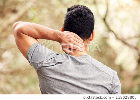 Neck pain, fitness and man in nature for training, running or workout burnout, stress or accident in forest. Athlete, runner or person from behind, back or spine problem with healthcare risk in woods 119029803