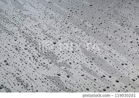 Surface view of water droplets on dark cover background. Water or rain droplets and wallpaper design concept 119030281