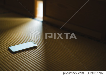 A smartphone placed in a Japanese-style room A smartphone placed in a Japanese-style room 119032707