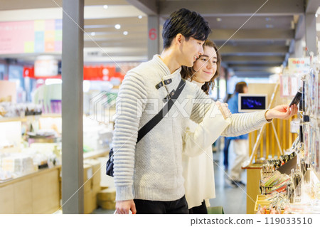 Young couple enjoying shopping Young couple enjoying shopping 119033510