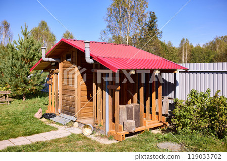 Rustic Outdoor Wooden Toilet in Countryside Setting Rustic Outdoor Wooden Toilet in Countryside Setting 119033702