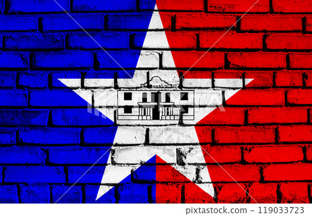 Flag of the city of San Antonio, Texas, USA, on a background of a brick wall. Conceptual collage 119033723