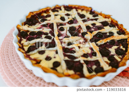 berry open pie in baking pan 119033816