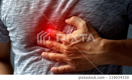 Close-up of a Man Experiencing Severe Heartburn or Chest Pain, Indicating Potential Health Issues 119034330