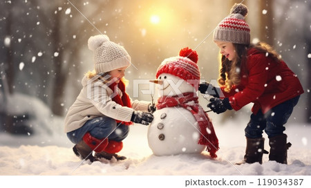 Kids building snow man playing outdoors on sunny snowy winter day. Outdoor family fun on Christmas vacation. Kids building snow man playing outdoors on sunny snowy winter day. Outdoor family fun on Christmas vacation. 119034387