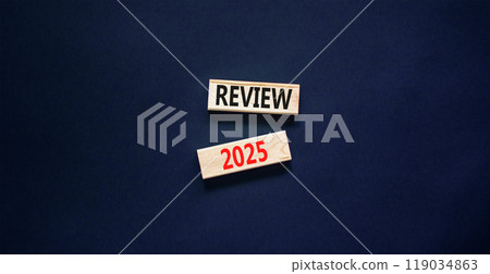 Planning review 2025 new year symbol. Concept words Review 2025 on beautiful wooden blocks. Beautiful black background. Business review 2025 new year concept. Copy space. Planning review 2025 new year symbol. Concept words Review 2025 on beautiful wooden blocks. Beautiful black background. Business review 2025 new year concept. Copy space. 119034863